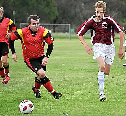 ZONING IN: Gatton’s Greg Leathart tries to take the ball from Mitchell Darton (right).Photo Emma Channon ZONING IN: Gatton’s Greg Leathart tries to take the ball from Mitchell Darton (right).Photo Emma Channon